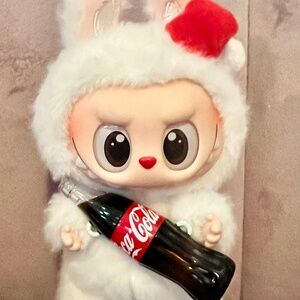 Both variations Coca-Cola labubus